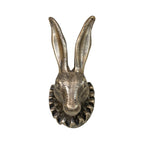 Decorative metallic rabbit head on a white background