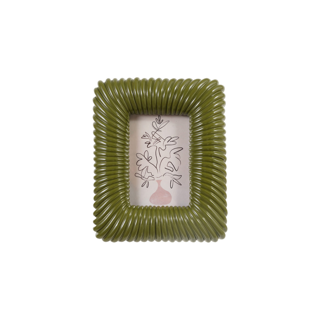 Green ribbed picture frame with a white background