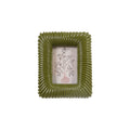 Green ribbed picture frame with a white background