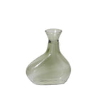 Sea glass bud vase on a white background