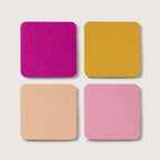 set of four coaster in fuschia, yellow, cream and pink