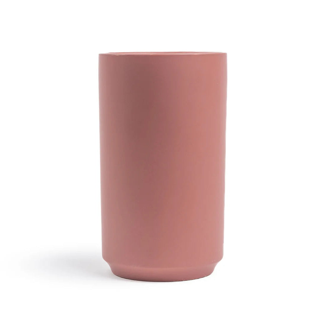 Pink vase on a white background