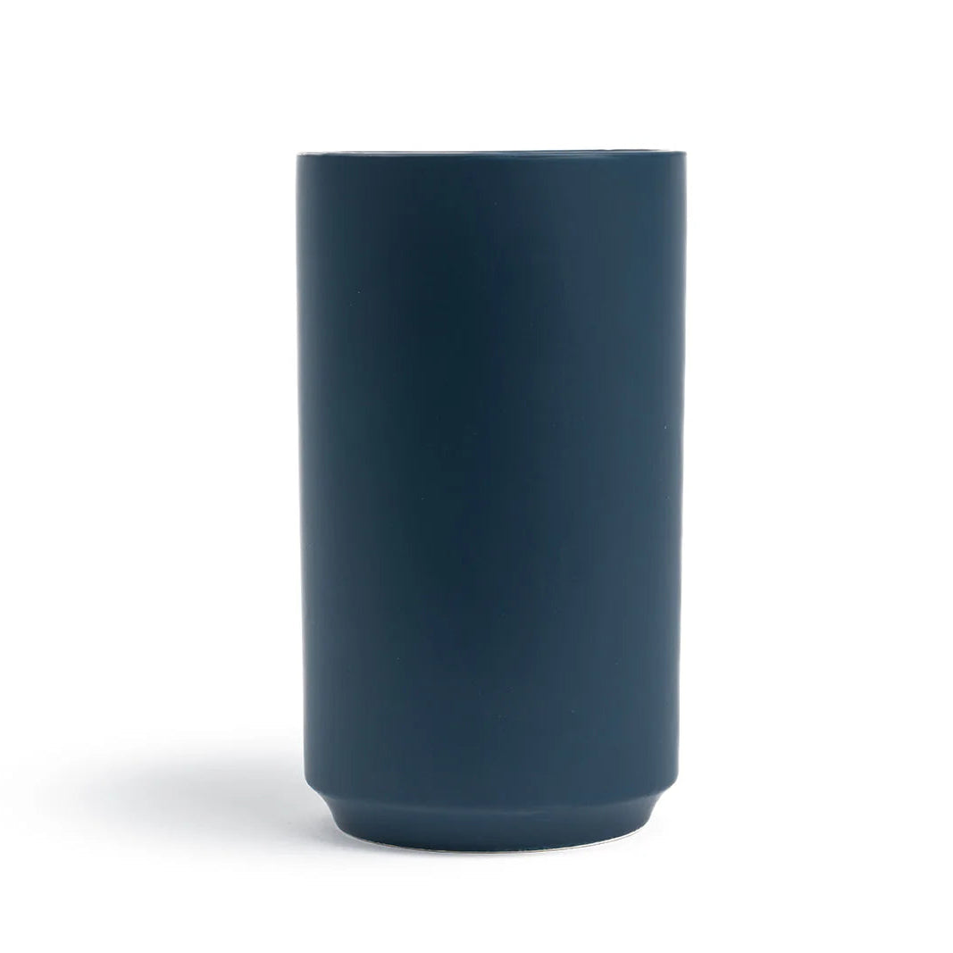 Dark blue vase on a white background