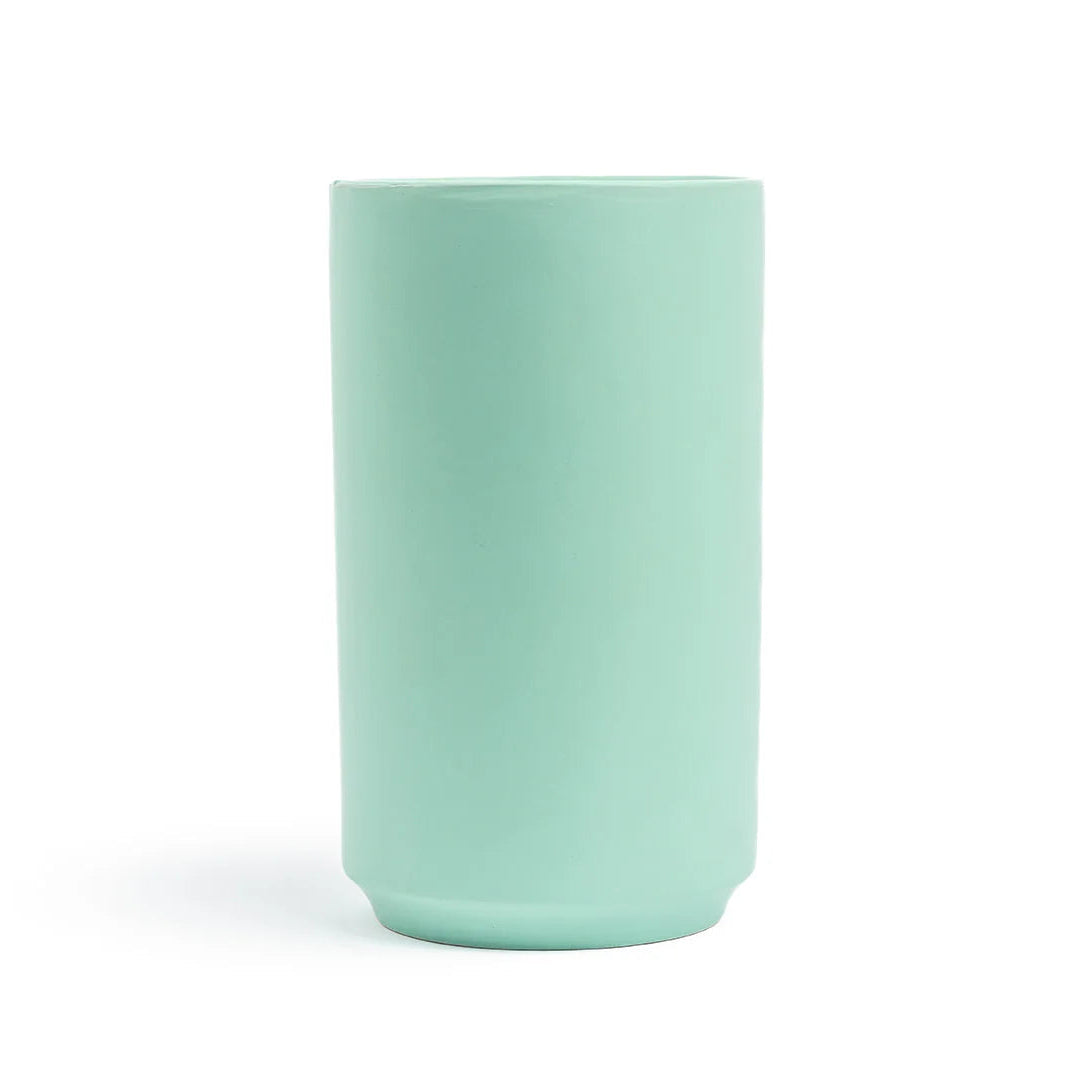 Mint green vase on a white background